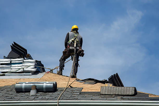 Professional Roof Replacement technician working in Taft, CA